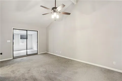 an empty room with fan