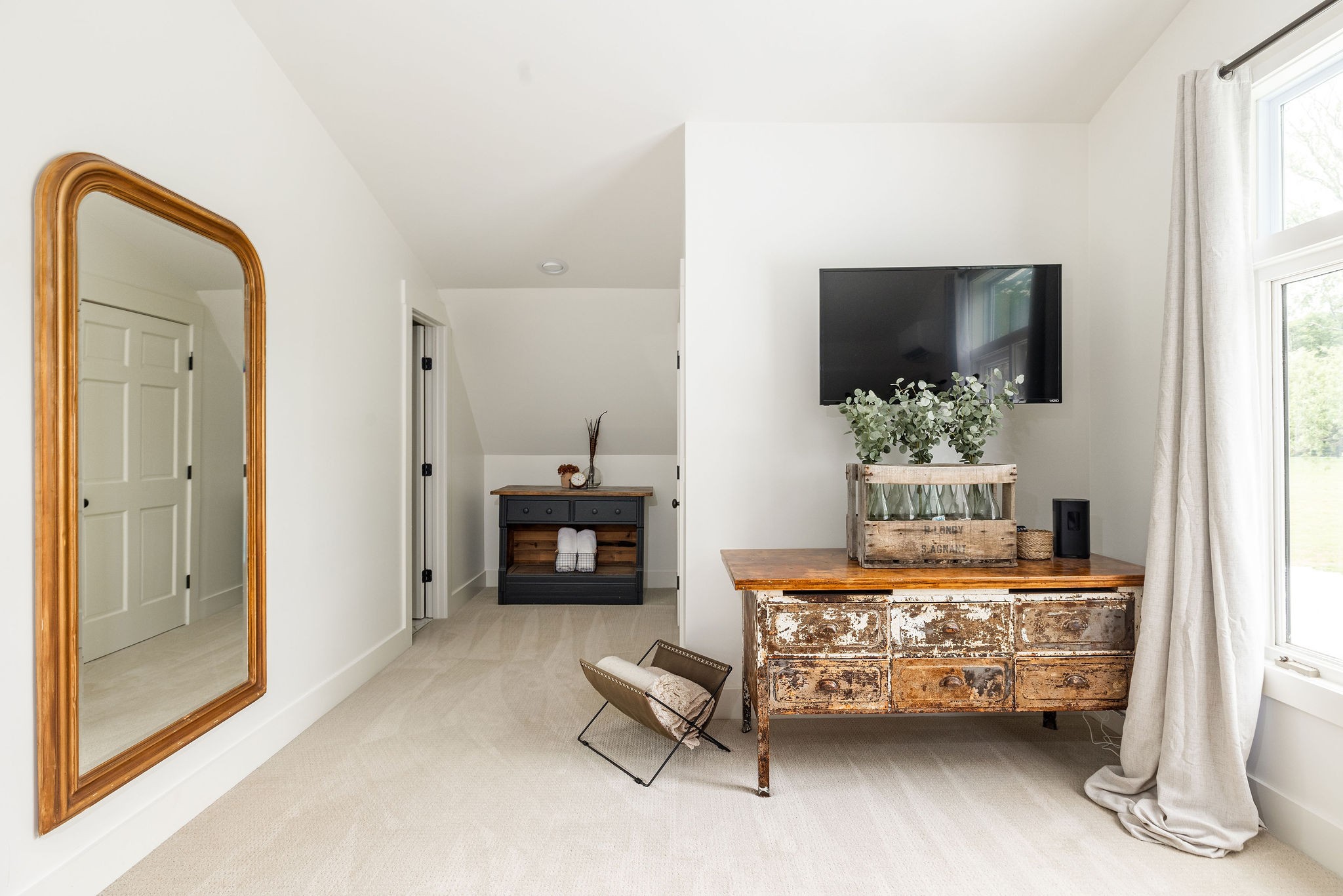 3309 Blazer Road Franklin, TN 37064 - Photo 17 of 32 a bedroom with furniture and a flat screen tv