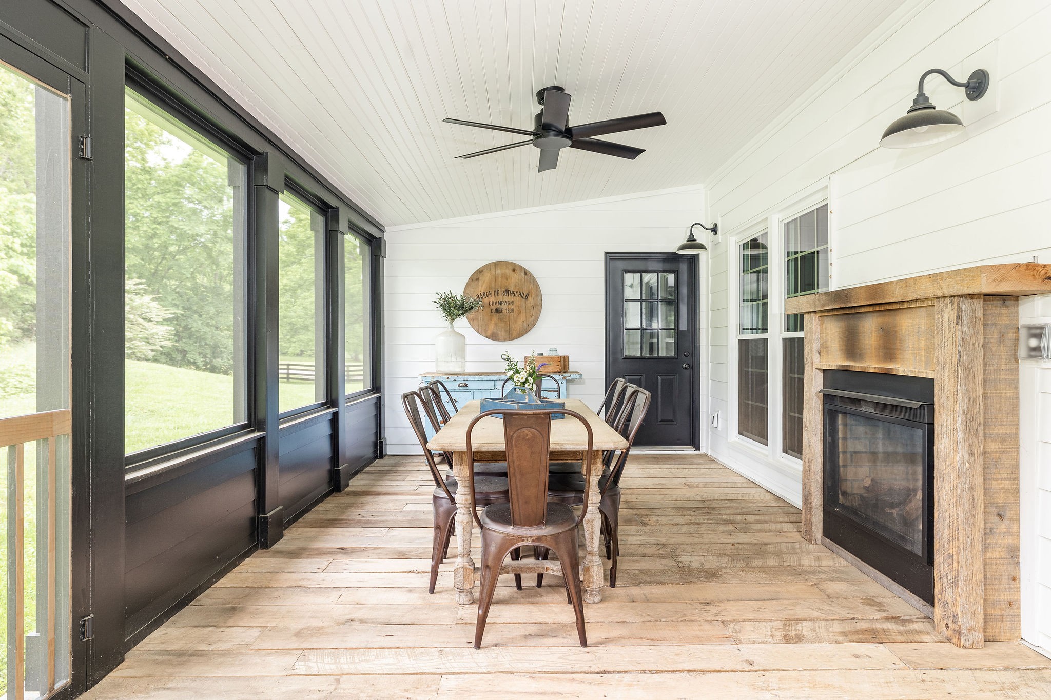 3309 Blazer Road Franklin, TN 37064 - Photo 24 of 32 a dining room with furniture a fireplace and wooden floor