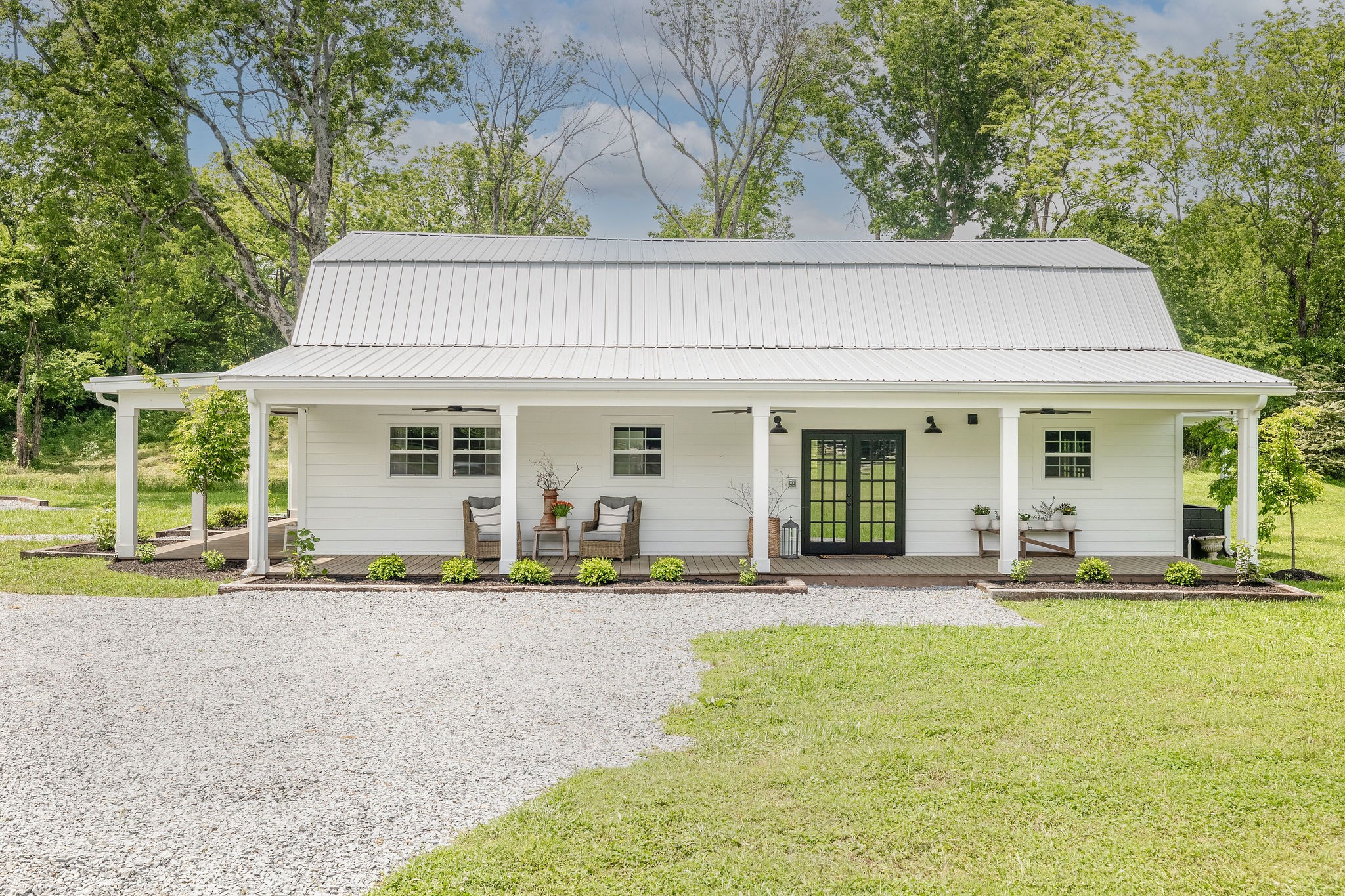 3309 Blazer Road Franklin, TN 37064 - Photo 5 of 32 a front view of house with outdoor seating and green space