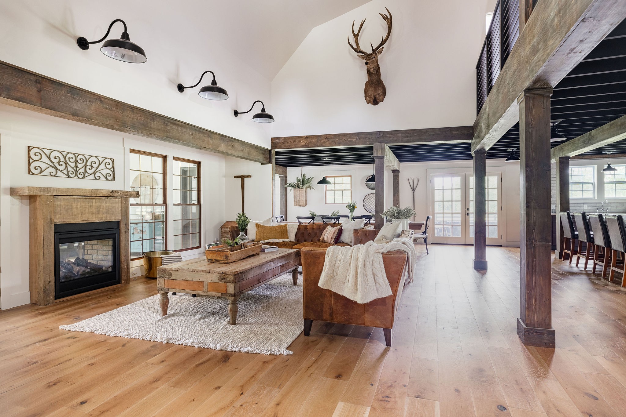 3309 Blazer Road Franklin, TN 37064 - Photo 10 of 32 a living room with furniture a fireplace and wooden floor