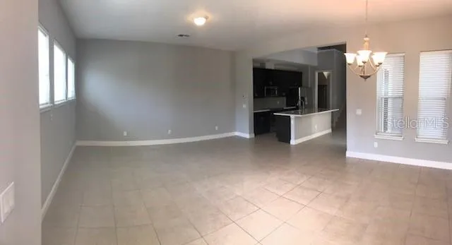 a view of a bathroom with a tub and mirror