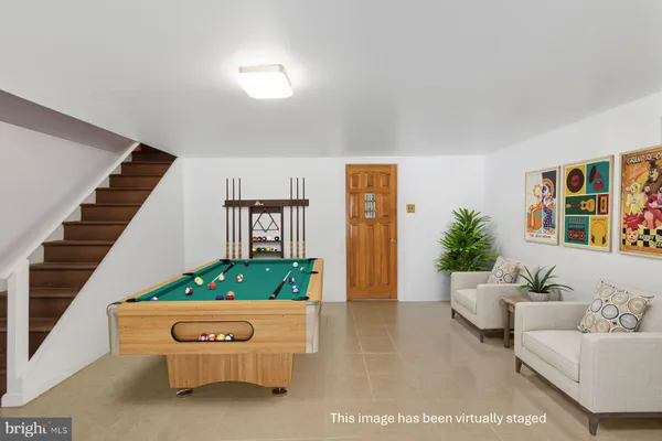 an empty room with wooden floor