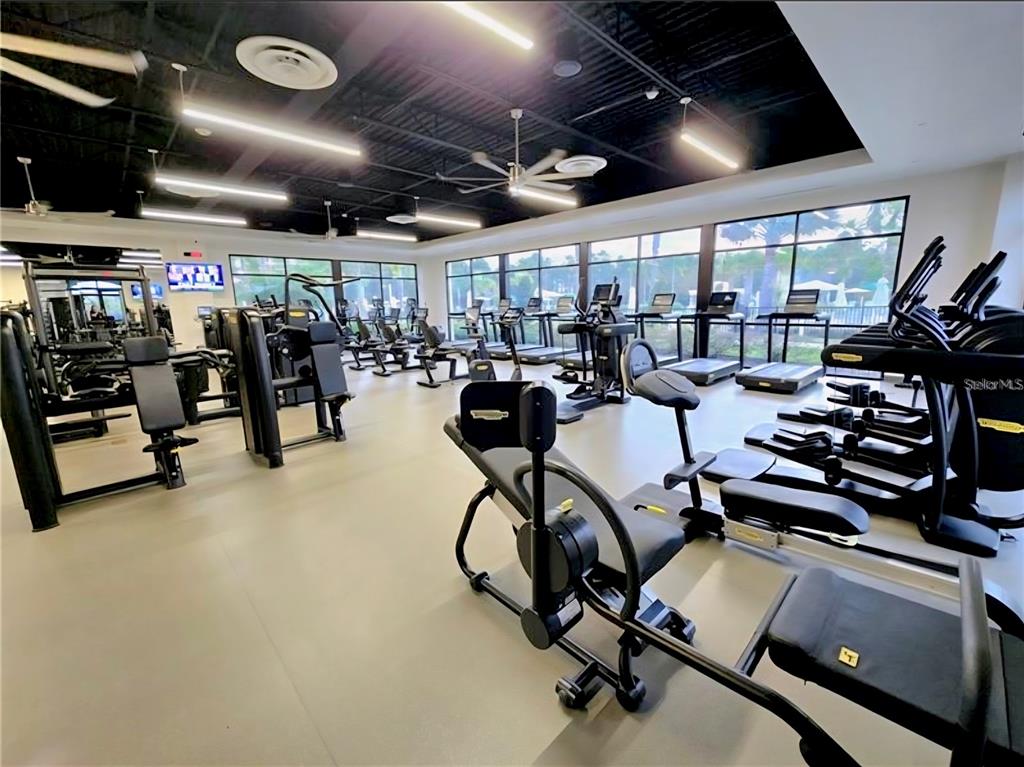6349 Mossy Oak Road St. Cloud, FL 34771 - Photo 78 of 82 a view of a room with gym equipment