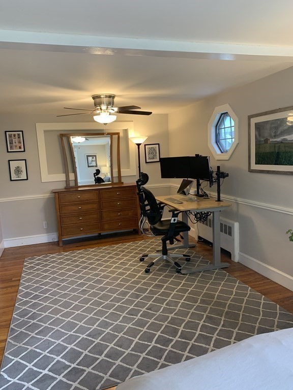 29 Bridge Street Hamilton, MA 01982 - Photo 12 of 16 a living room with furniture and a table