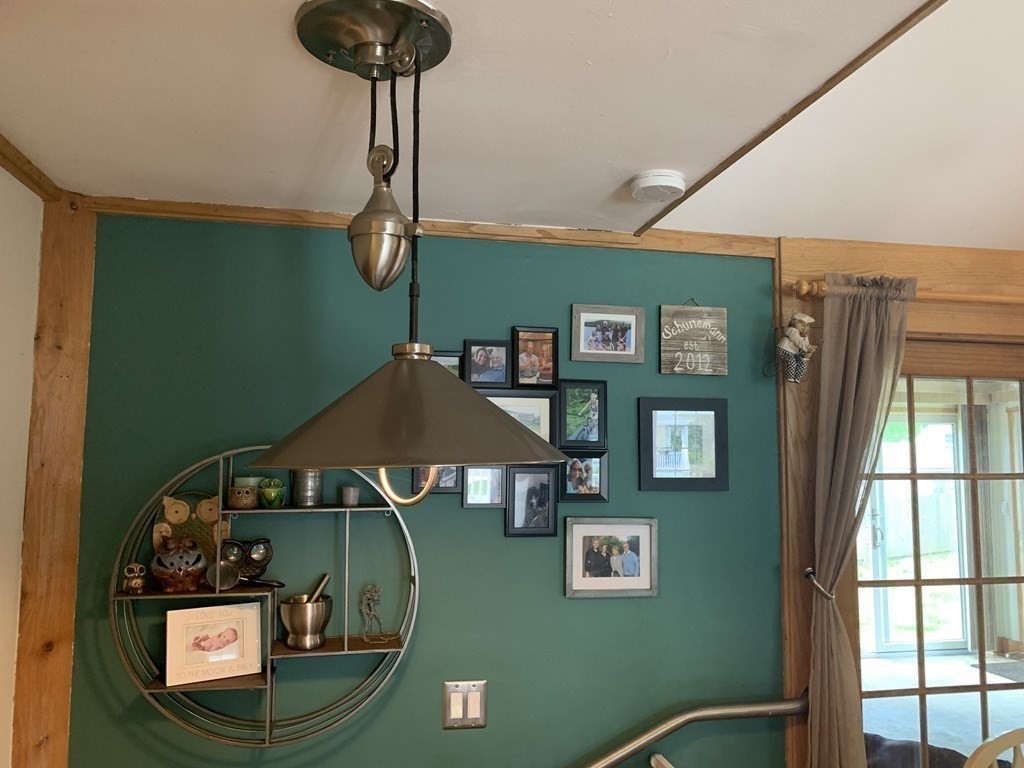 29 Bridge Street Hamilton, MA 01982 - Photo 8 of 16 a view of a balcony with chairs