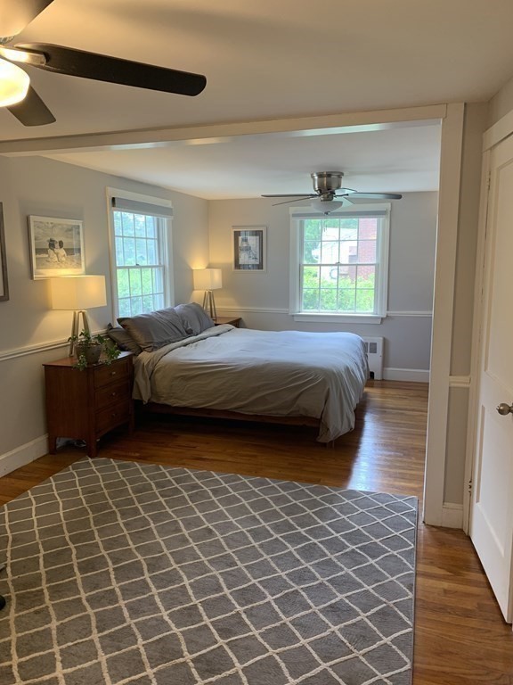 29 Bridge Street Hamilton, MA 01982 - Photo 10 of 16 a bedroom with a bed and window