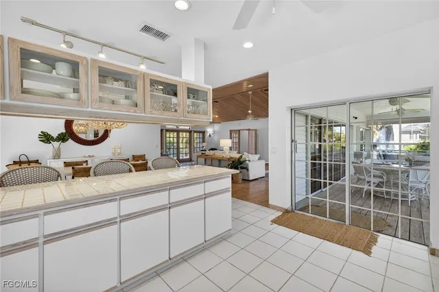 a room with a sink and a mirror