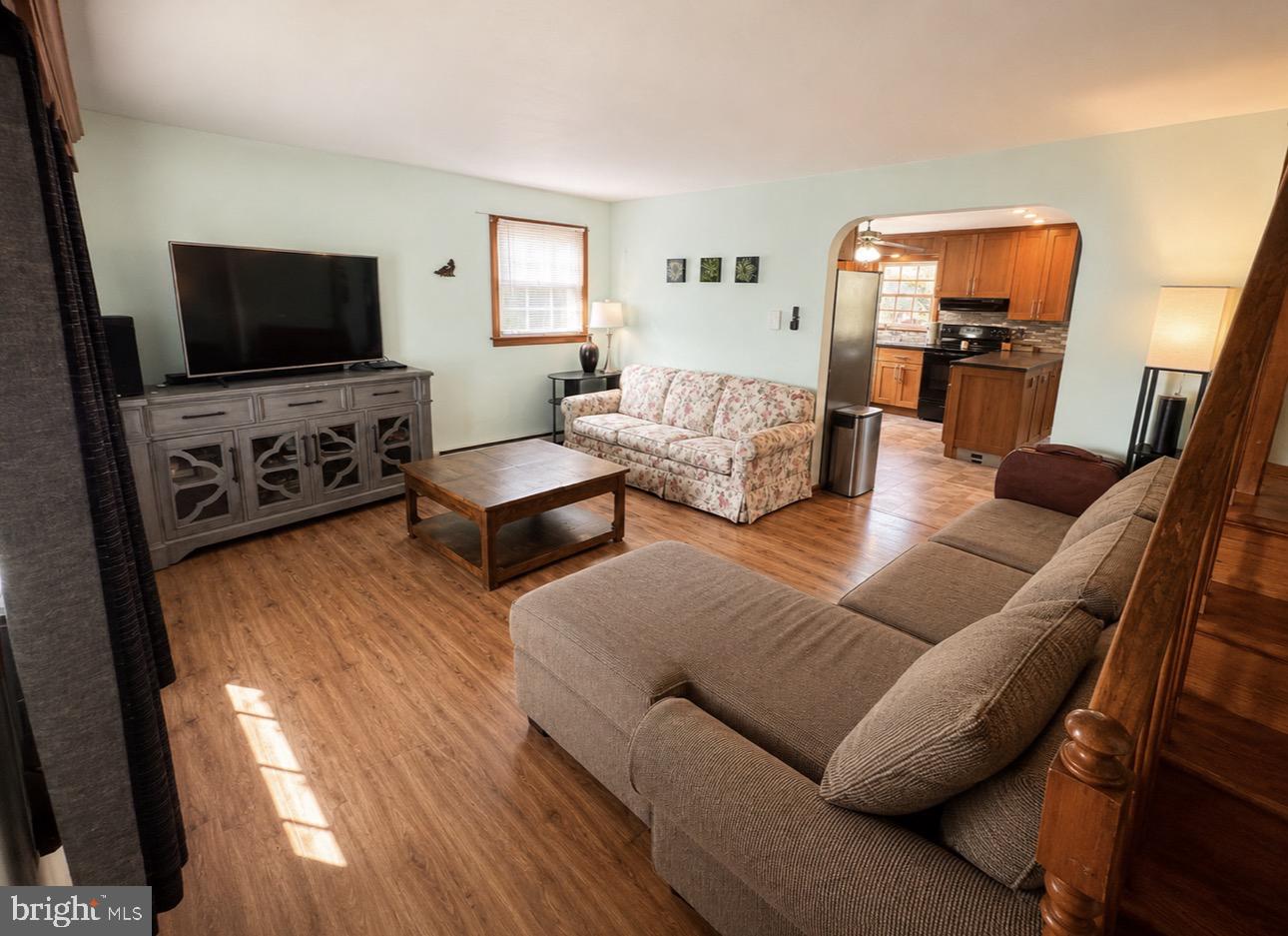 487 Prospect Road Manheim, PA 17545 - Photo 7 of 24 a living room with furniture and a flat screen tv