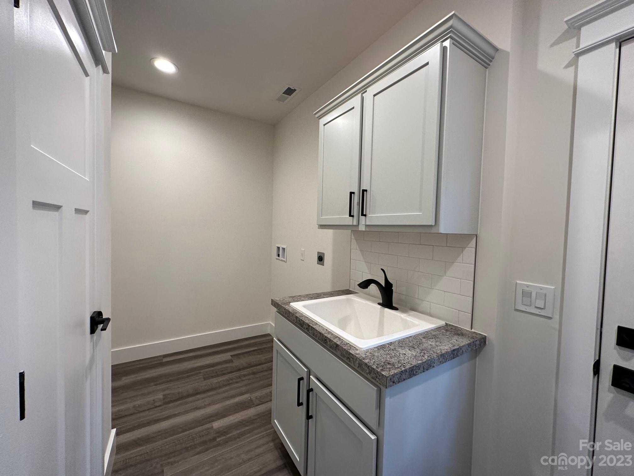 152 Cascade Rdg Road Fairview, NC 28730 - Photo 16 of 18 a bathroom with a sink and a mirror