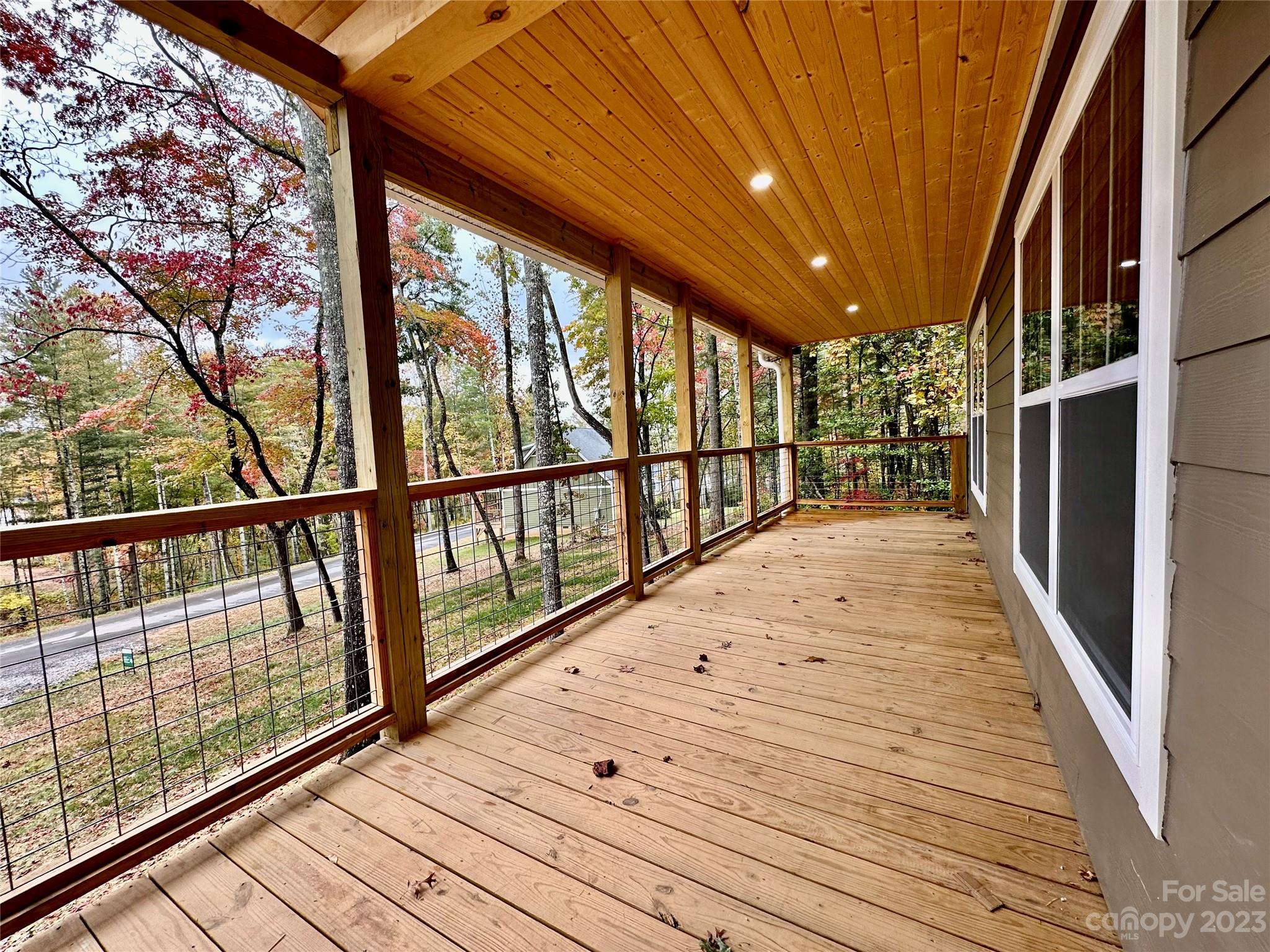 152 Cascade Rdg Road Fairview, NC 28730 - Photo 3 of 18 a view of balcony with wooden floor