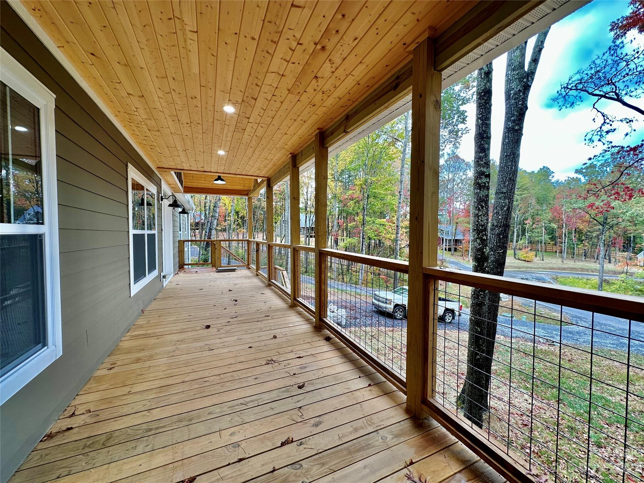 152 Cascade Rdg Road Fairview, NC 28730 - Photo 4 of 18 a view of a balcony with wooden floor