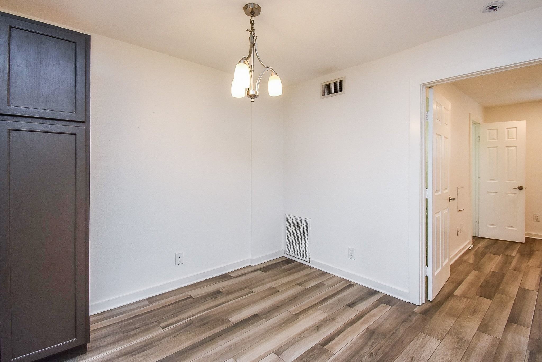 1404 Welch Street, Unit 2 Houston, TX 77006 - Photo 12 of 20 Dedicated dining space conveniently located adjacent to the kitchen and living area, ideal for entertaining and everyday living.