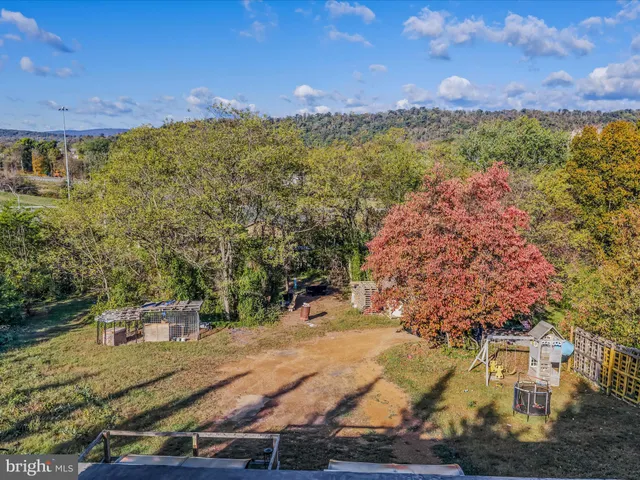 a view of a backyard of a building