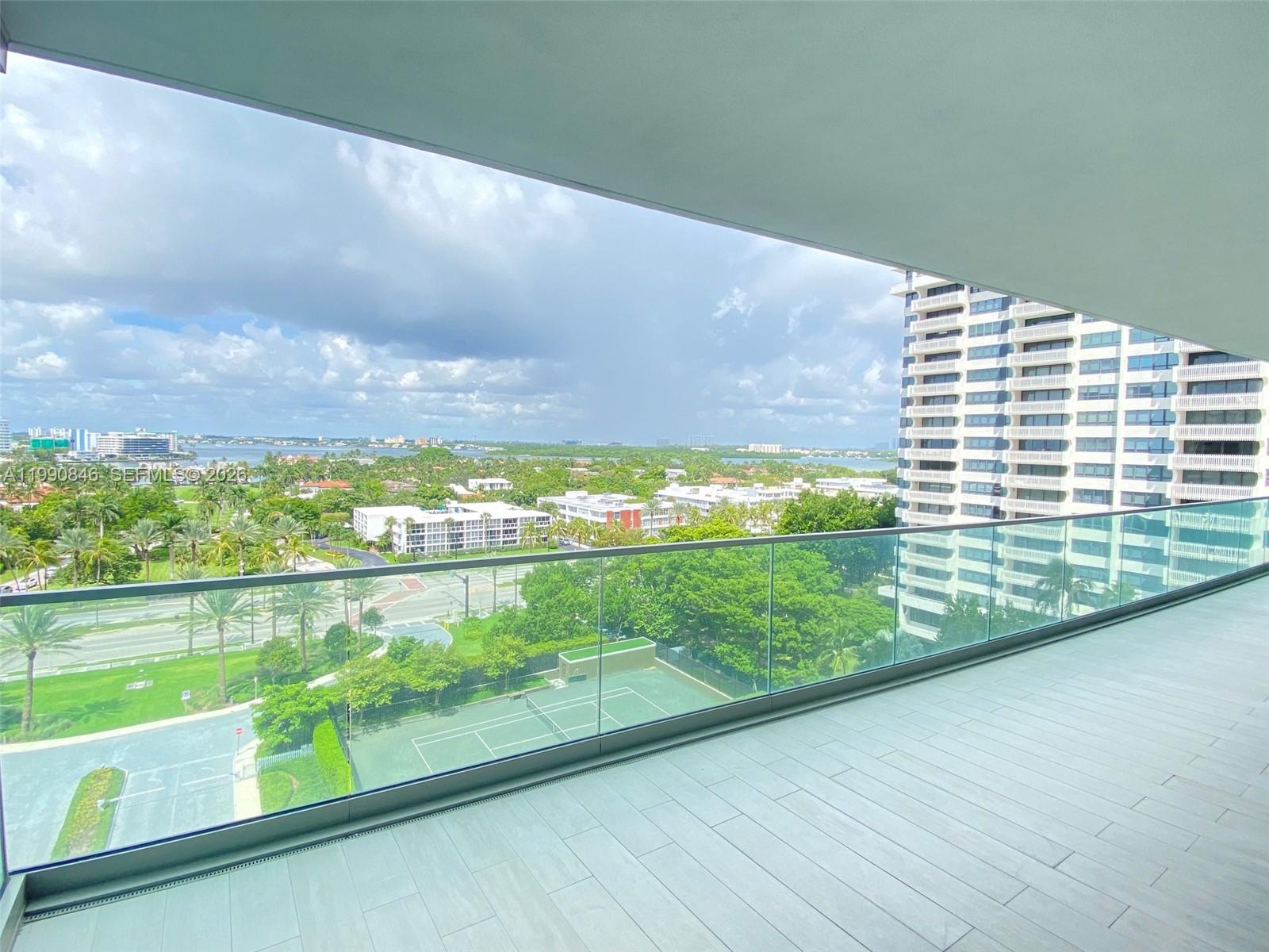 10203 Collins Avenue, Unit 905 Bal Harbour, FL 33154 - Photo 20 of 35 a view of a yard from a balcony
