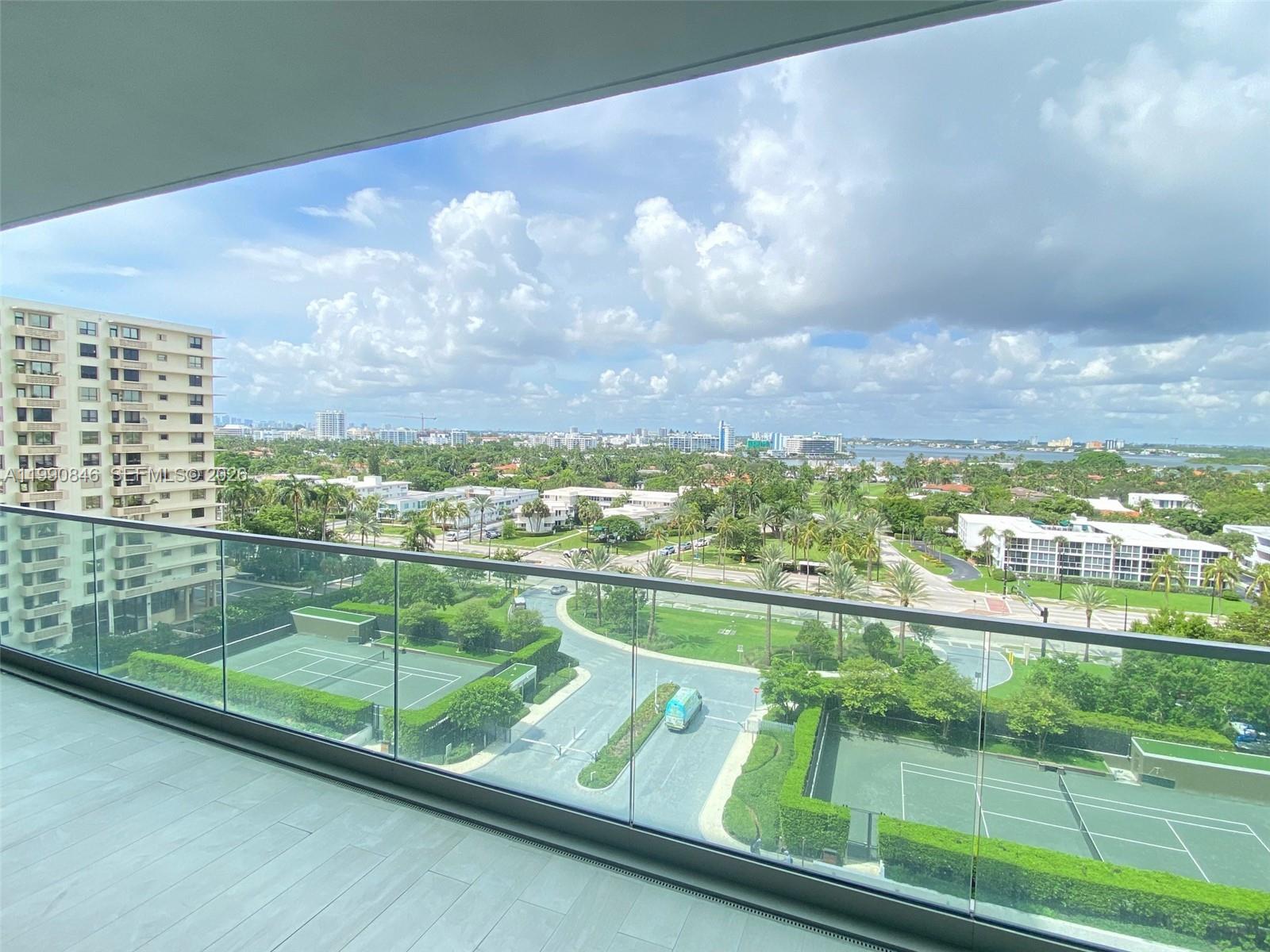 10203 Collins Avenue, Unit 905 Bal Harbour, FL 33154 - Photo 21 of 35 a view of a city from a balcony