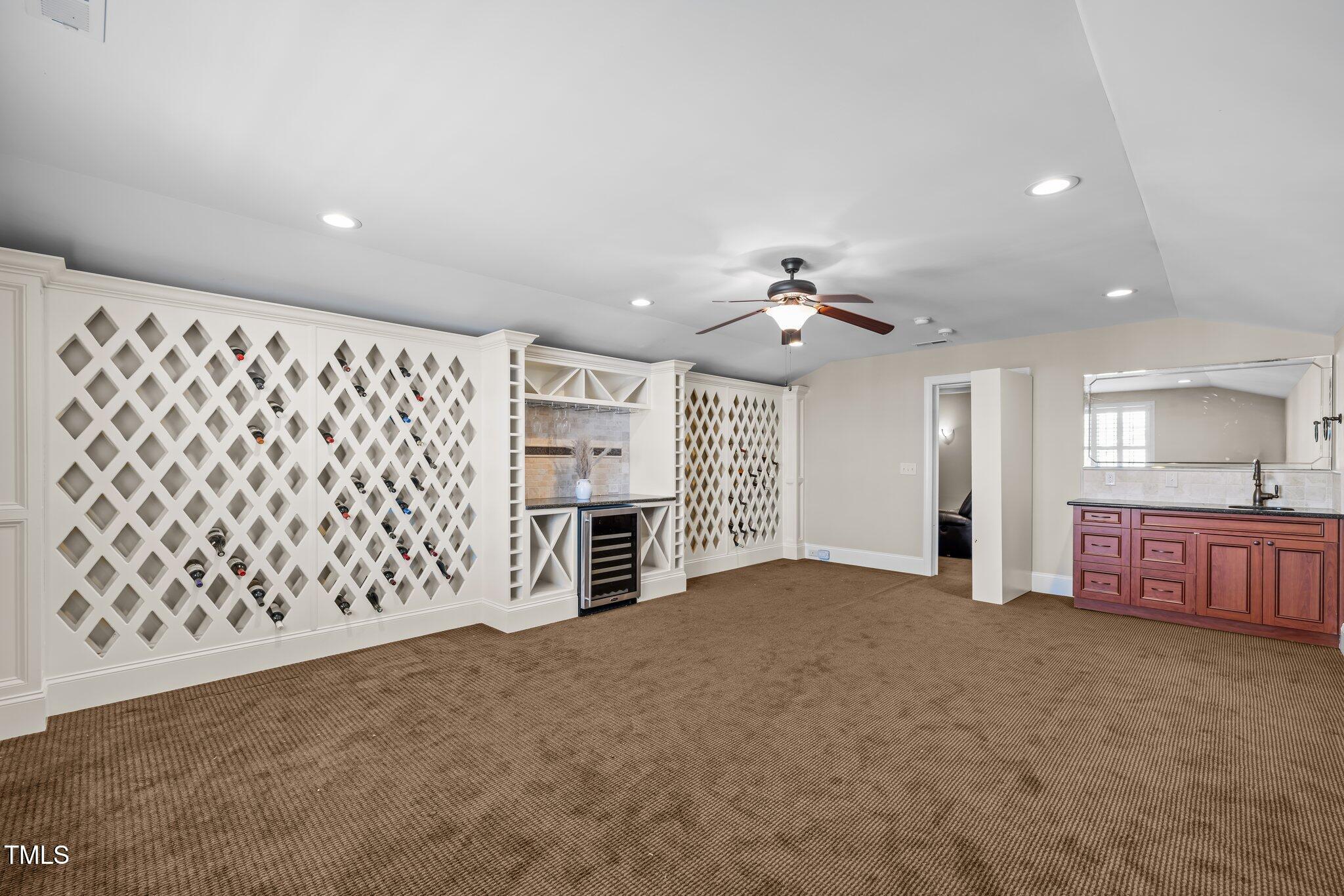 1086 Tender Drive Apex, NC 27502 - Photo 19 of 35 a view of a livingroom with a ceiling fan and window