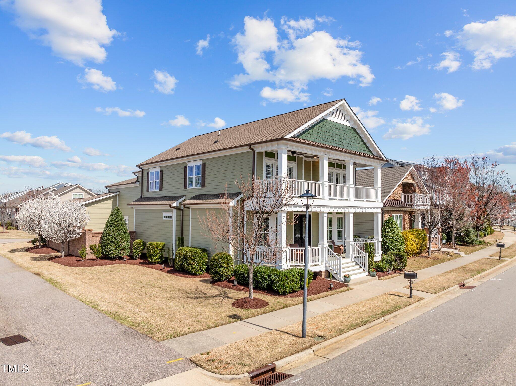 1086 Tender Drive Apex, NC 27502 - Photo 2 of 35 a front view of a house with a yard