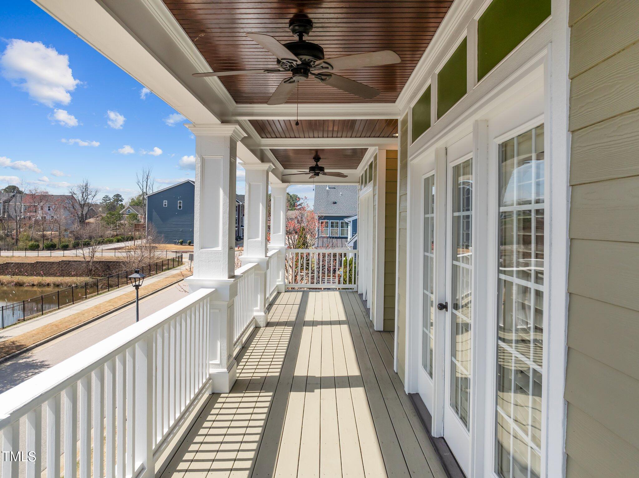 1086 Tender Drive Apex, NC 27502 - Photo 28 of 35 a view of a balcony with wooden floor