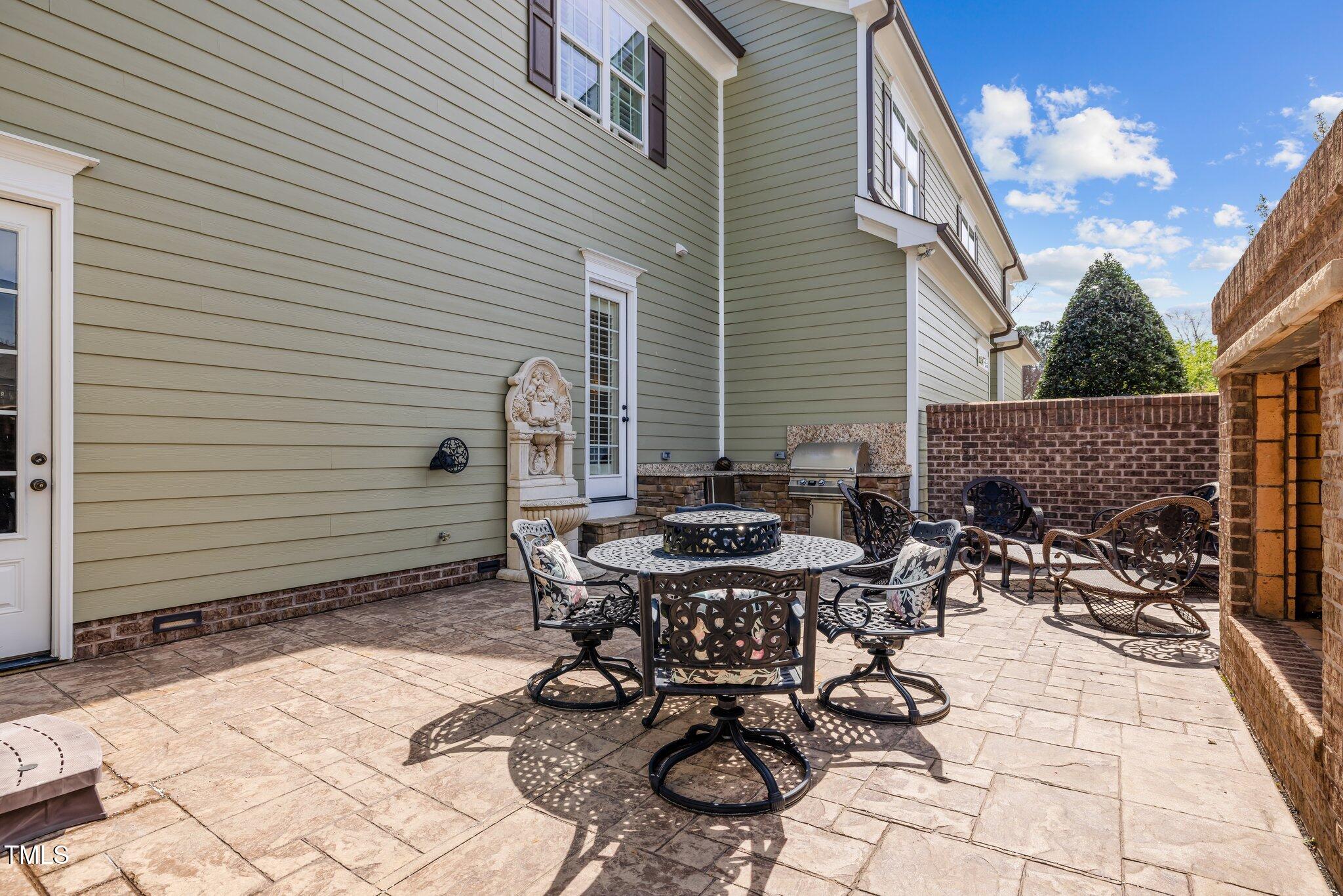 1086 Tender Drive Apex, NC 27502 - Photo 29 of 35 a view of backyard with sitting area