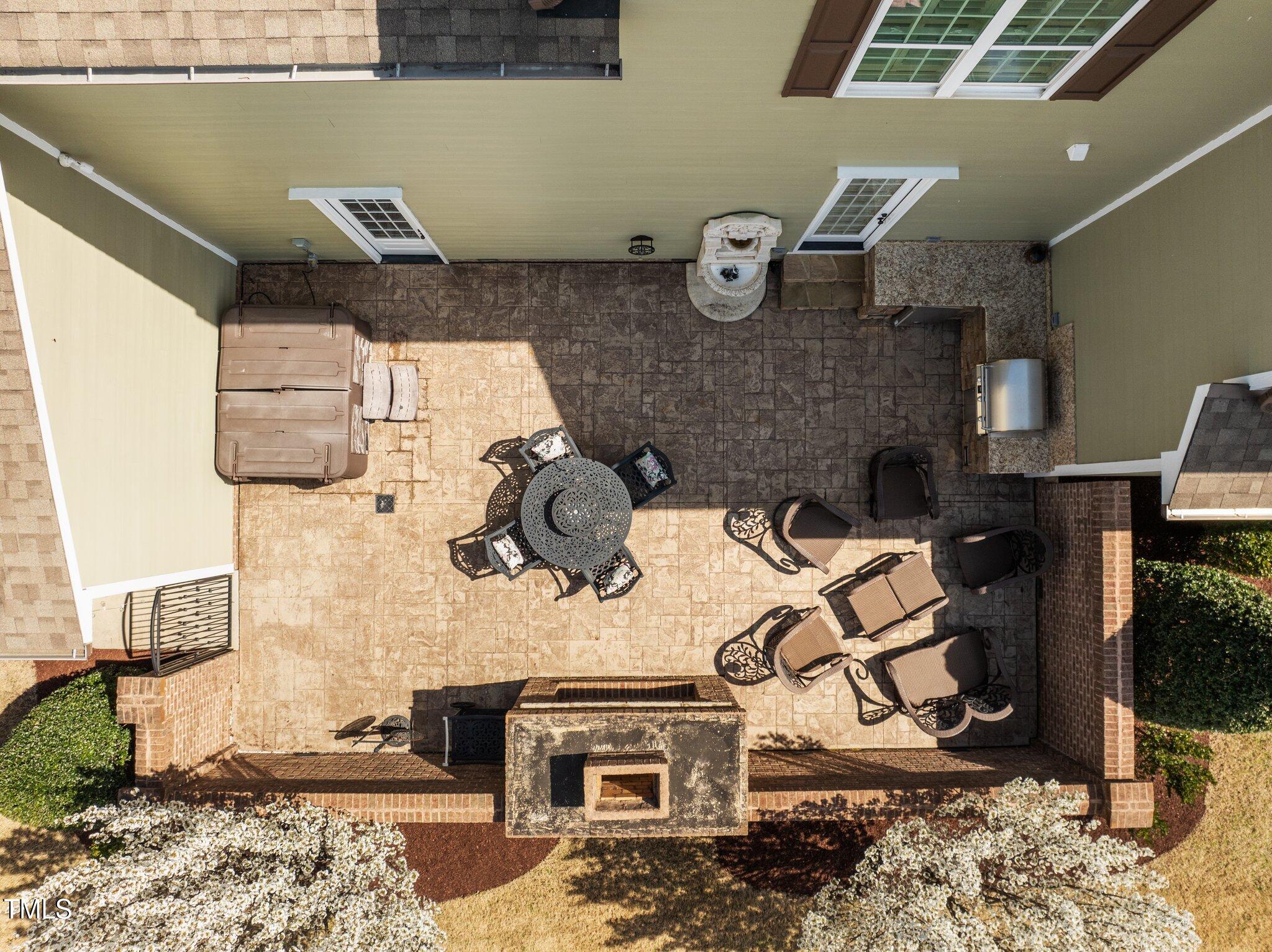 1086 Tender Drive Apex, NC 27502 - Photo 32 of 35 a kitchen with a stove and a wooden floor