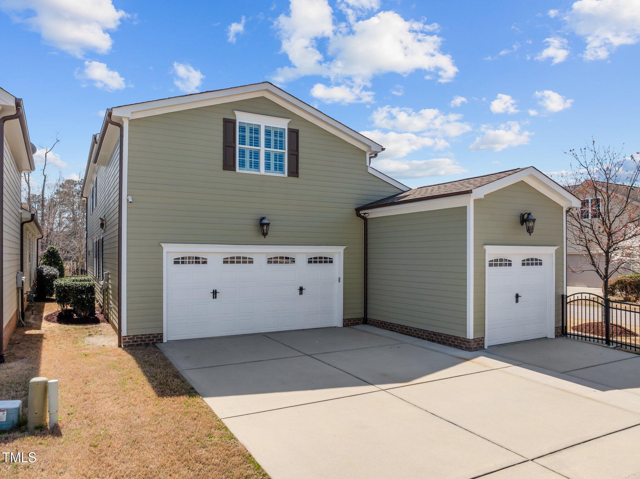 1086 Tender Drive Apex, NC 27502 - Photo 33 of 35 a view of a house with a yard