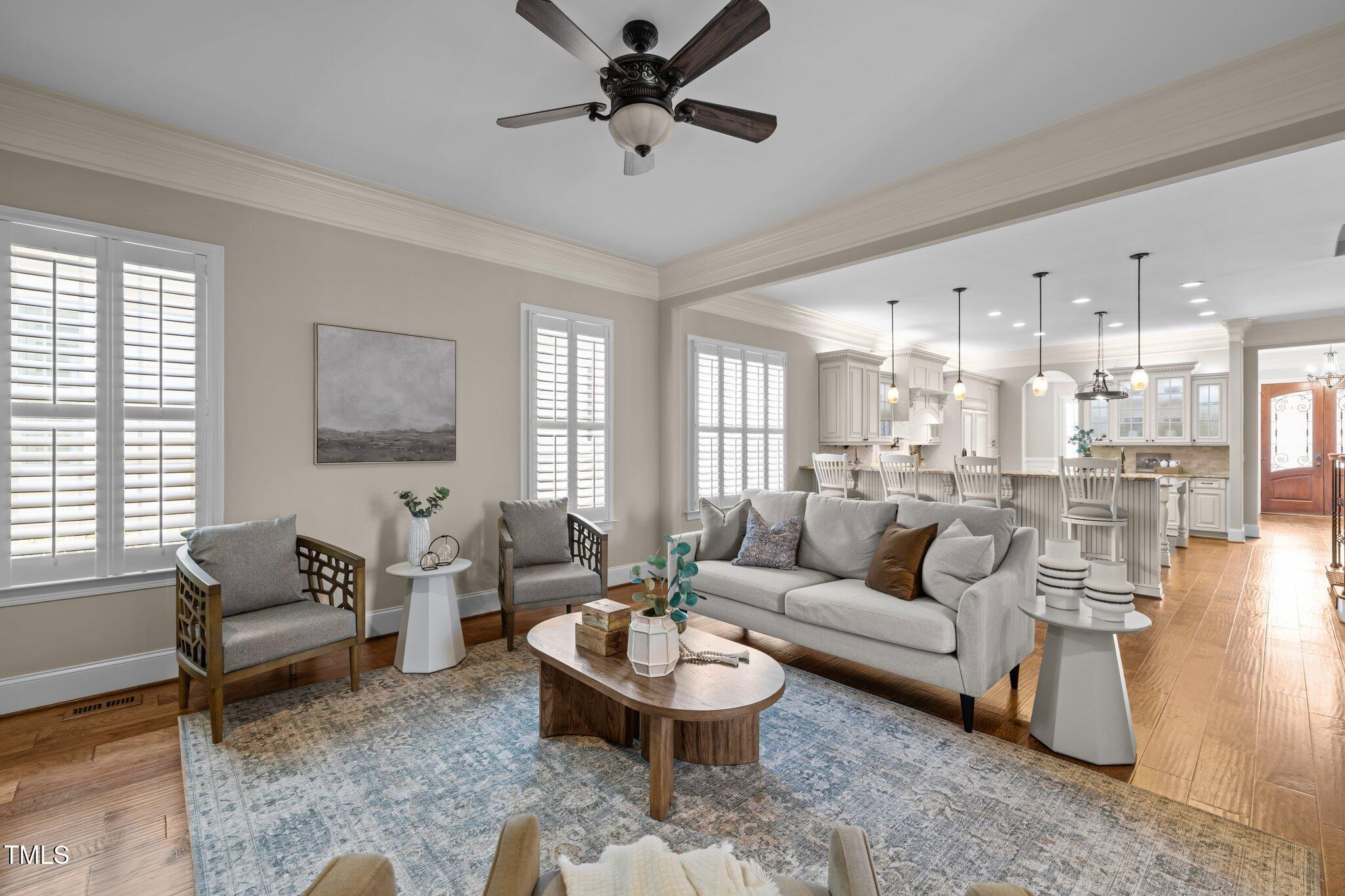 1086 Tender Drive Apex, NC 27502 - Photo 10 of 35 a living room with furniture and a large window