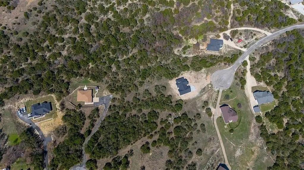525 Anchor Way Bluff Dale, TX 76433 - Photo 2 of 3 an aerial view of houses with yard