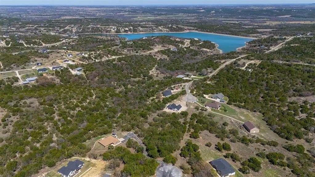 525 Anchor Way Bluff Dale, TX 76433 - Photo 3 of 3 an aerial view of a house with a lake view