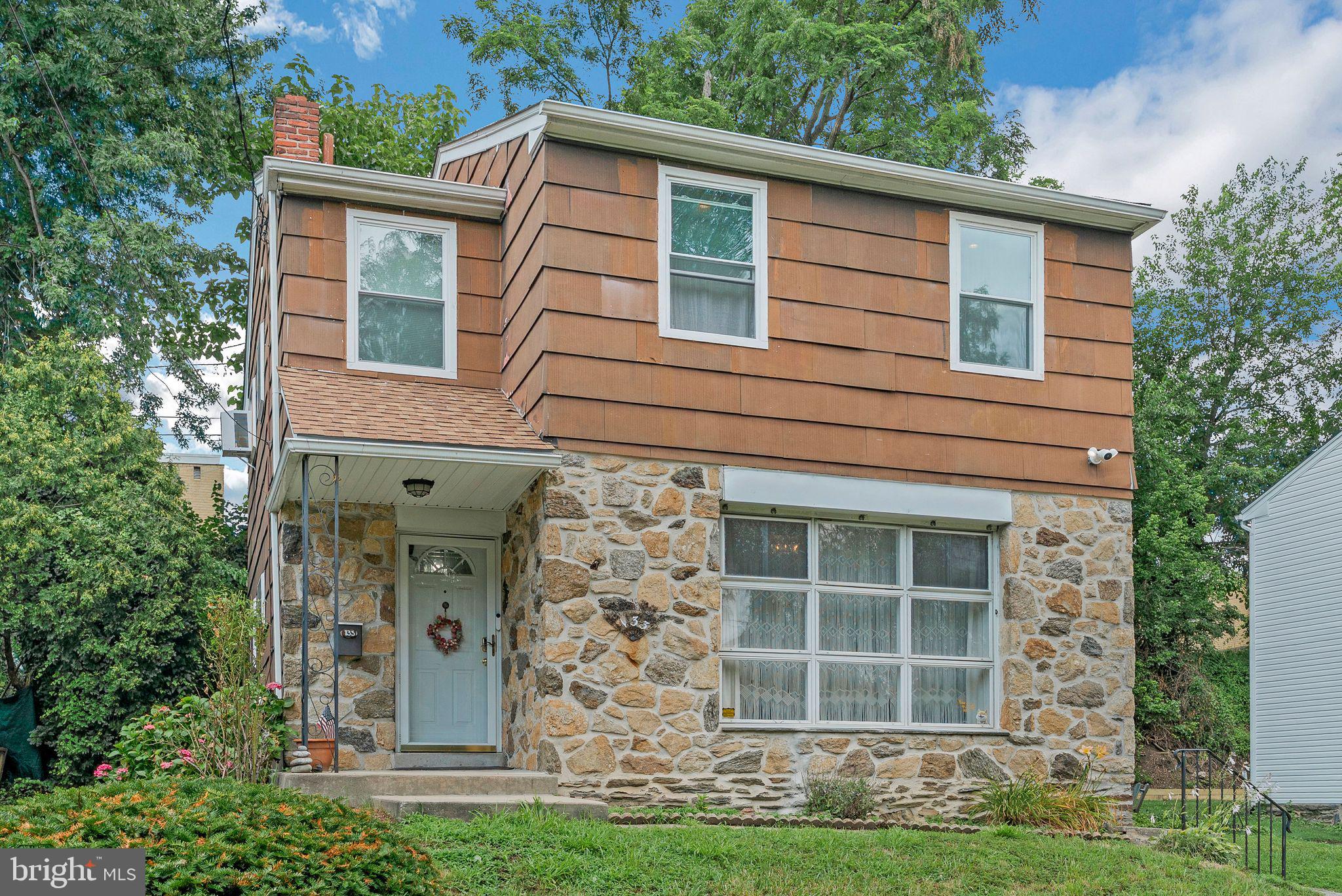 133 Lewis Road Havertown, PA 19083 - Photo 1 of 33 a front view of a house with a yard