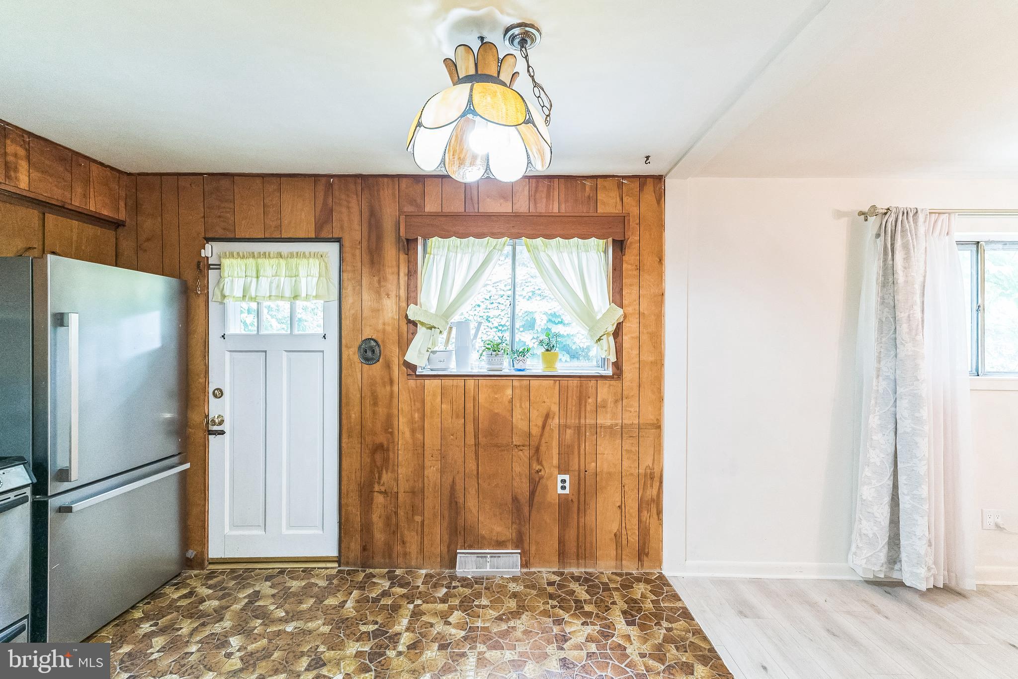 133 Lewis Road Havertown, PA 19083 - Photo 15 of 33 a kitchen with a refrigerator and countertop window