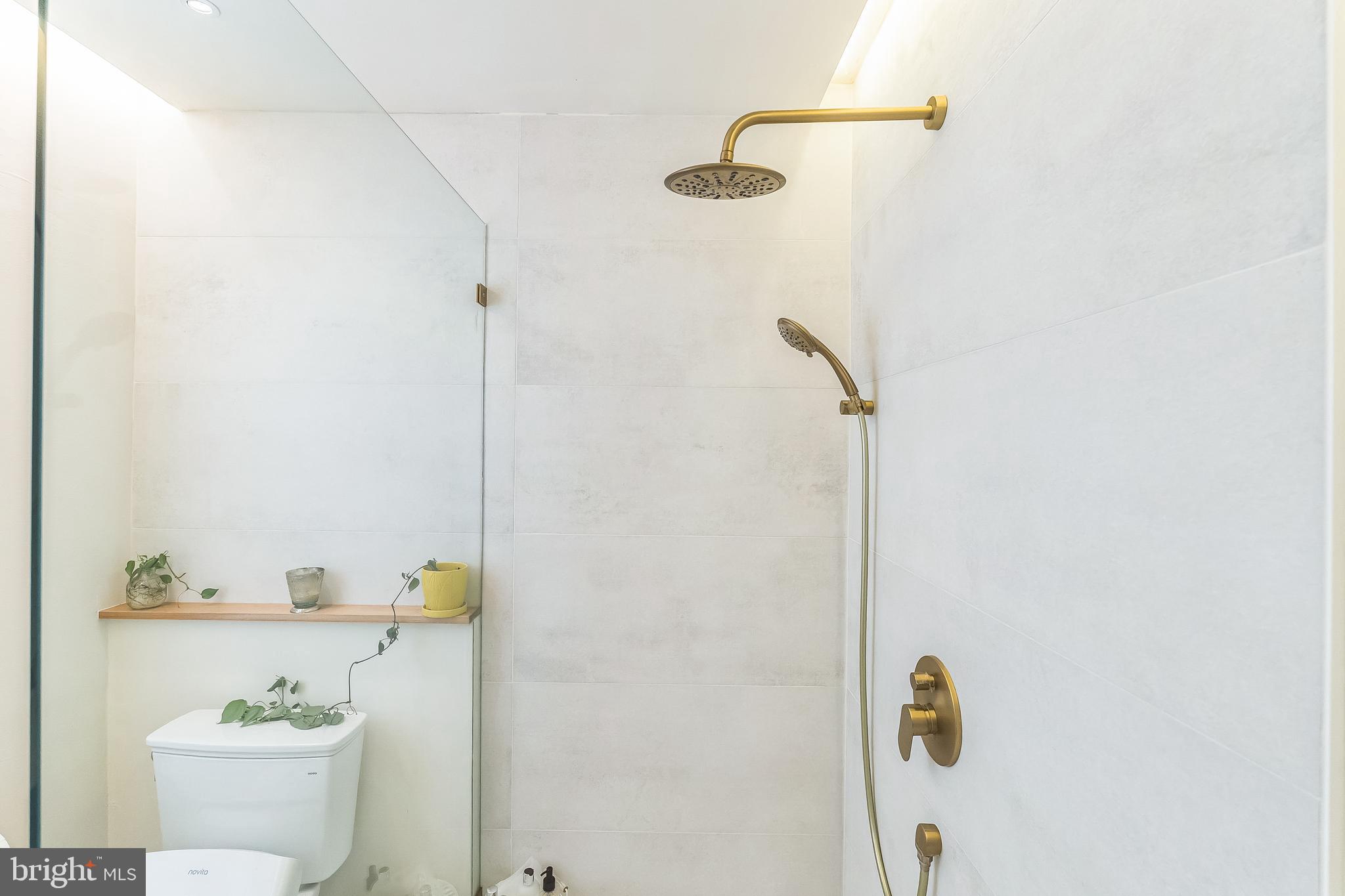 133 Lewis Road Havertown, PA 19083 - Photo 24 of 33 a bathroom with a shower and a sink