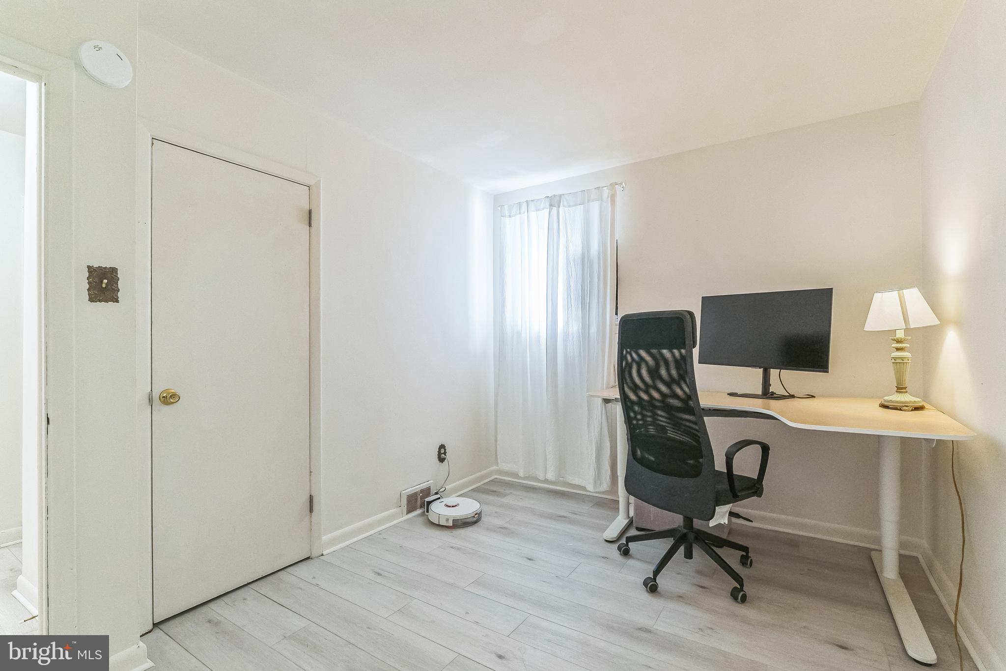 133 Lewis Road Havertown, PA 19083 - Photo 26 of 33 a view of workspace with wooden floor shelves