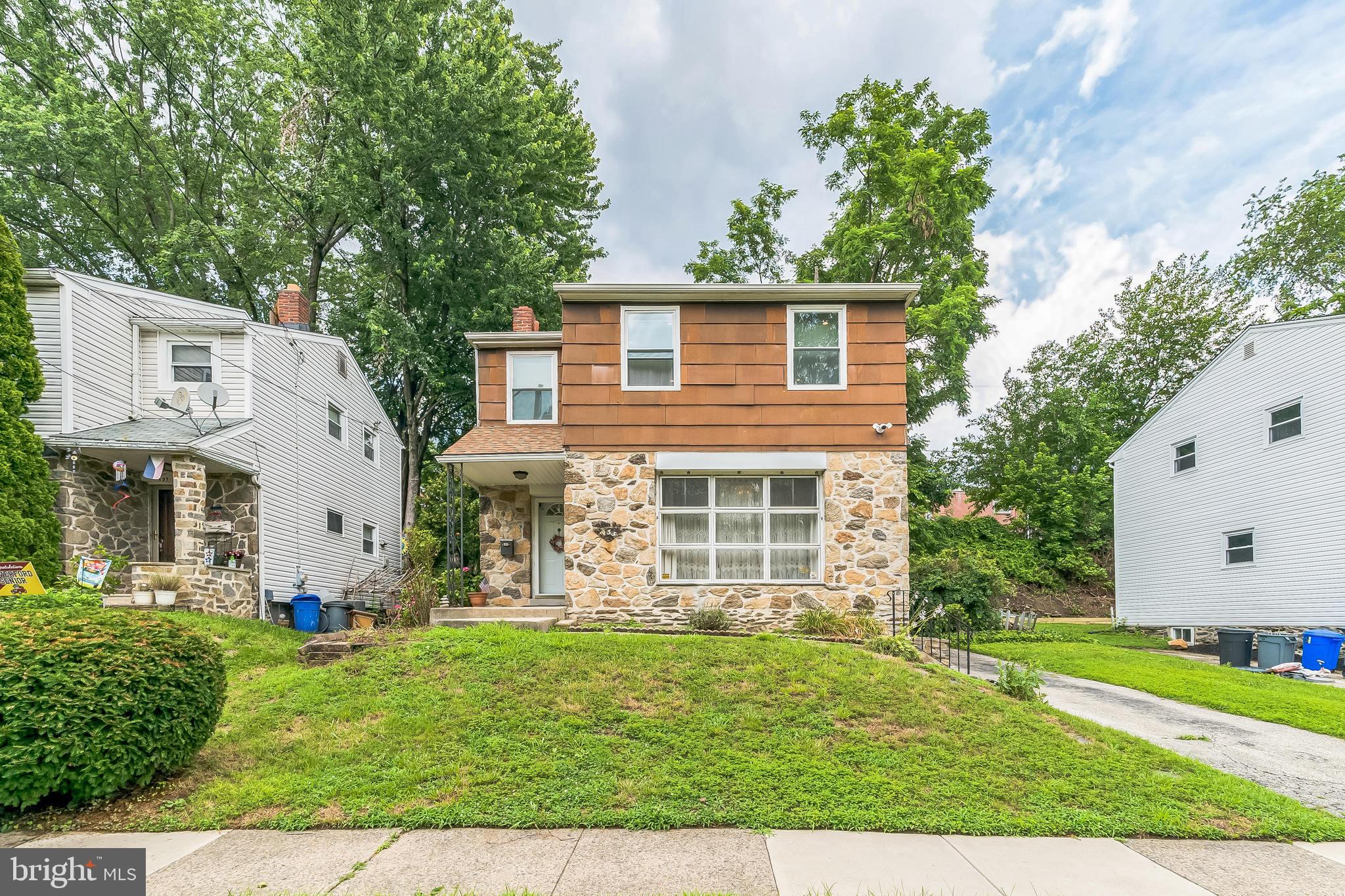 133 Lewis Road Havertown, PA 19083 - Photo 3 of 33 front view of a house with a yard