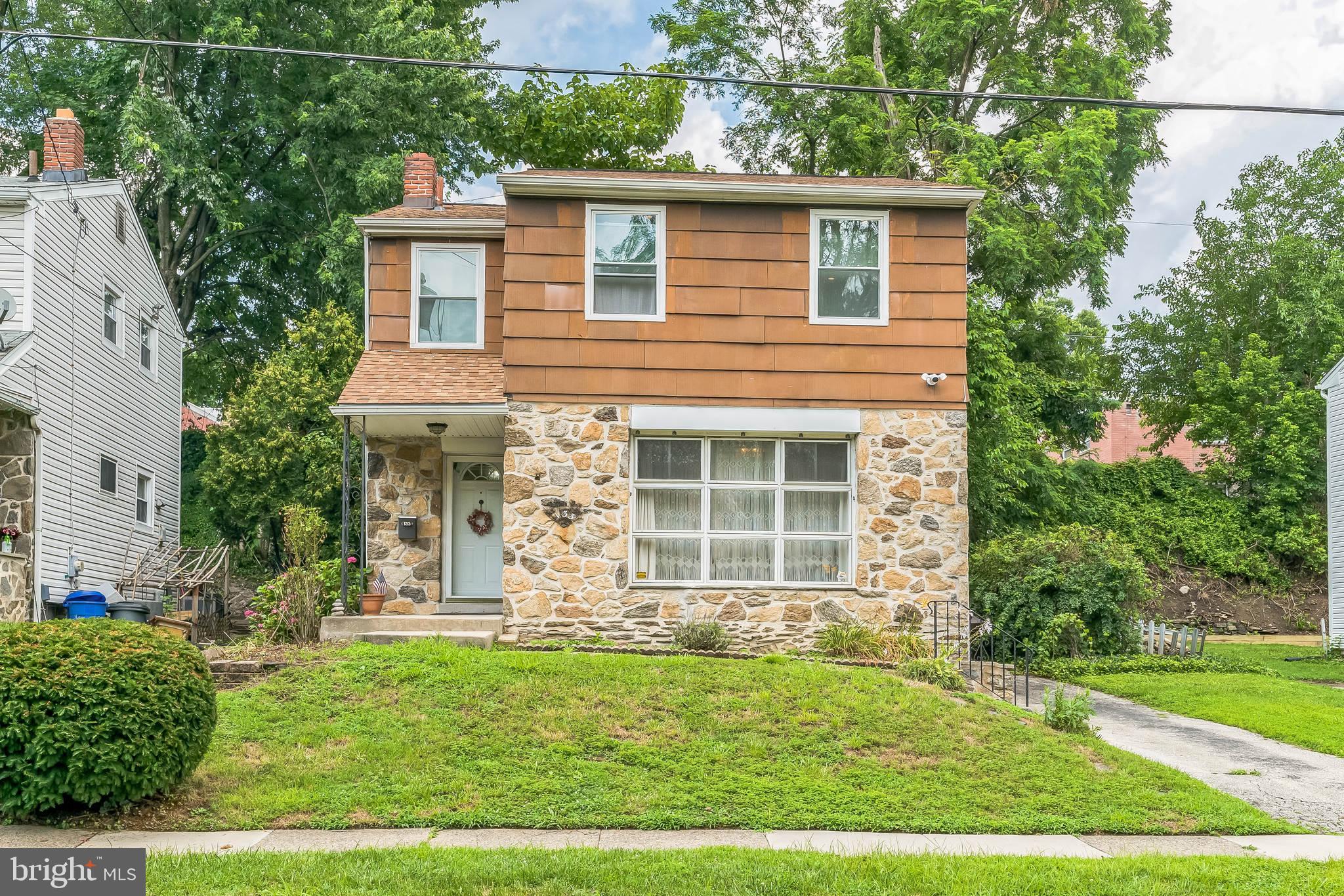 133 Lewis Road Havertown, PA 19083 - Photo 5 of 33 front view of a house with a yard