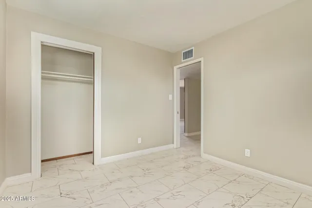 an empty room with closet