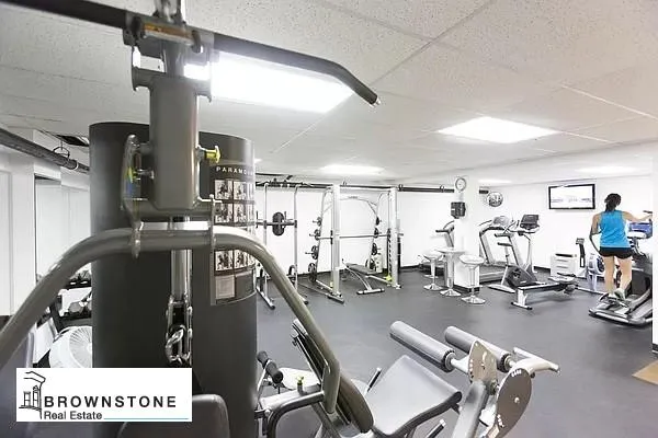 a gym room with gym equipment