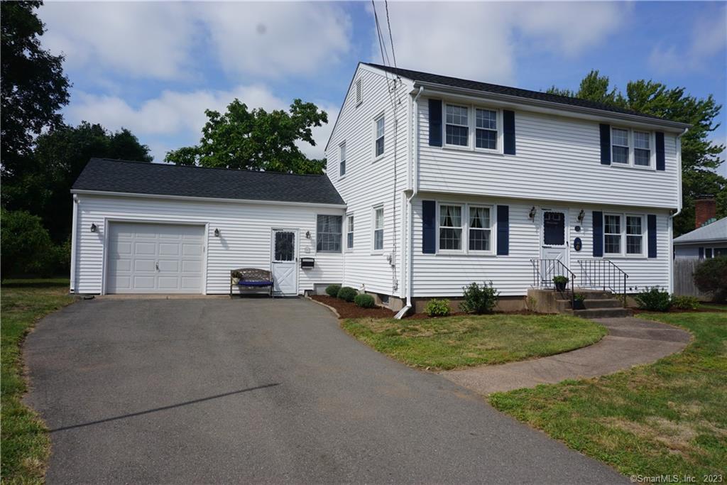 20 Schaller Road Manchester, CT 06042 - Photo 1 of 1 a view of a yard in front of a house
