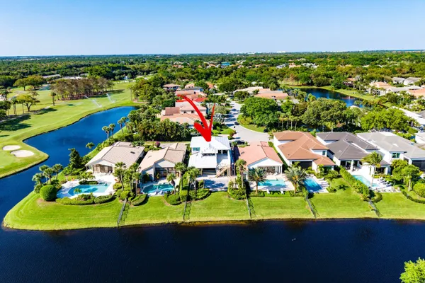 an aerial view of a with a big yard