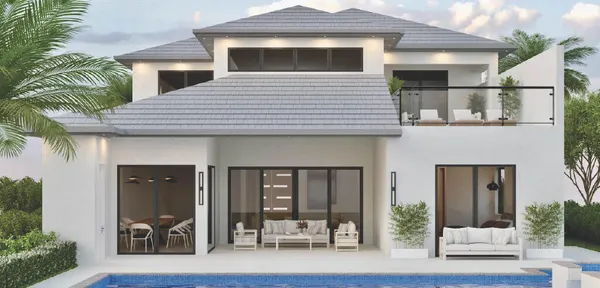 a front view of a house with glass windows and furniture