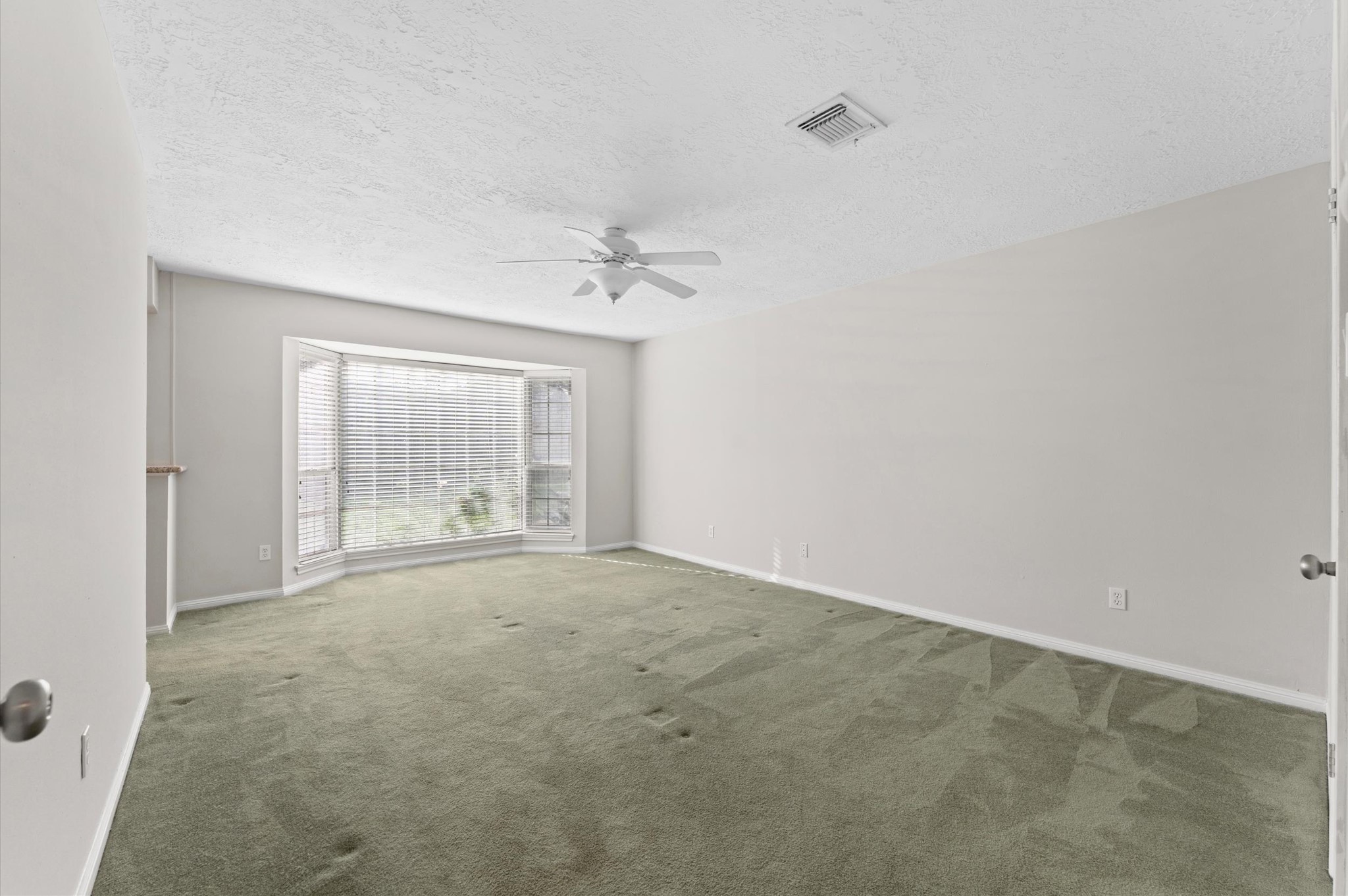 19415 Craigchester Lane Spring, TX 77388 - Photo 18 of 31 a view of an empty room with a window