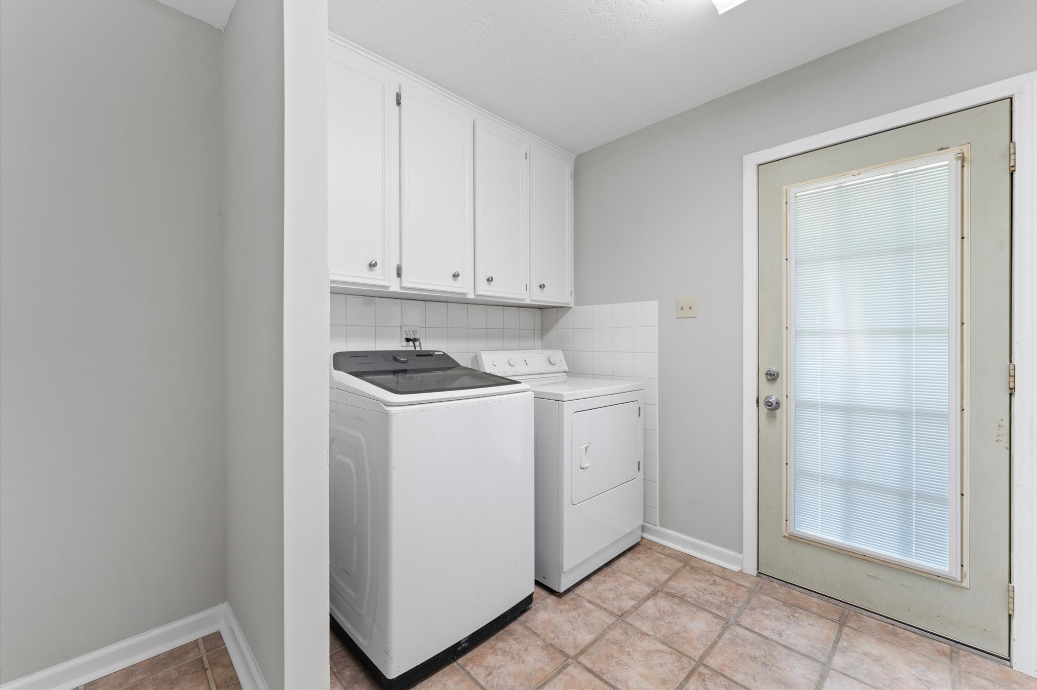 19415 Craigchester Lane Spring, TX 77388 - Photo 22 of 31 a view of utility room with washer and dryer