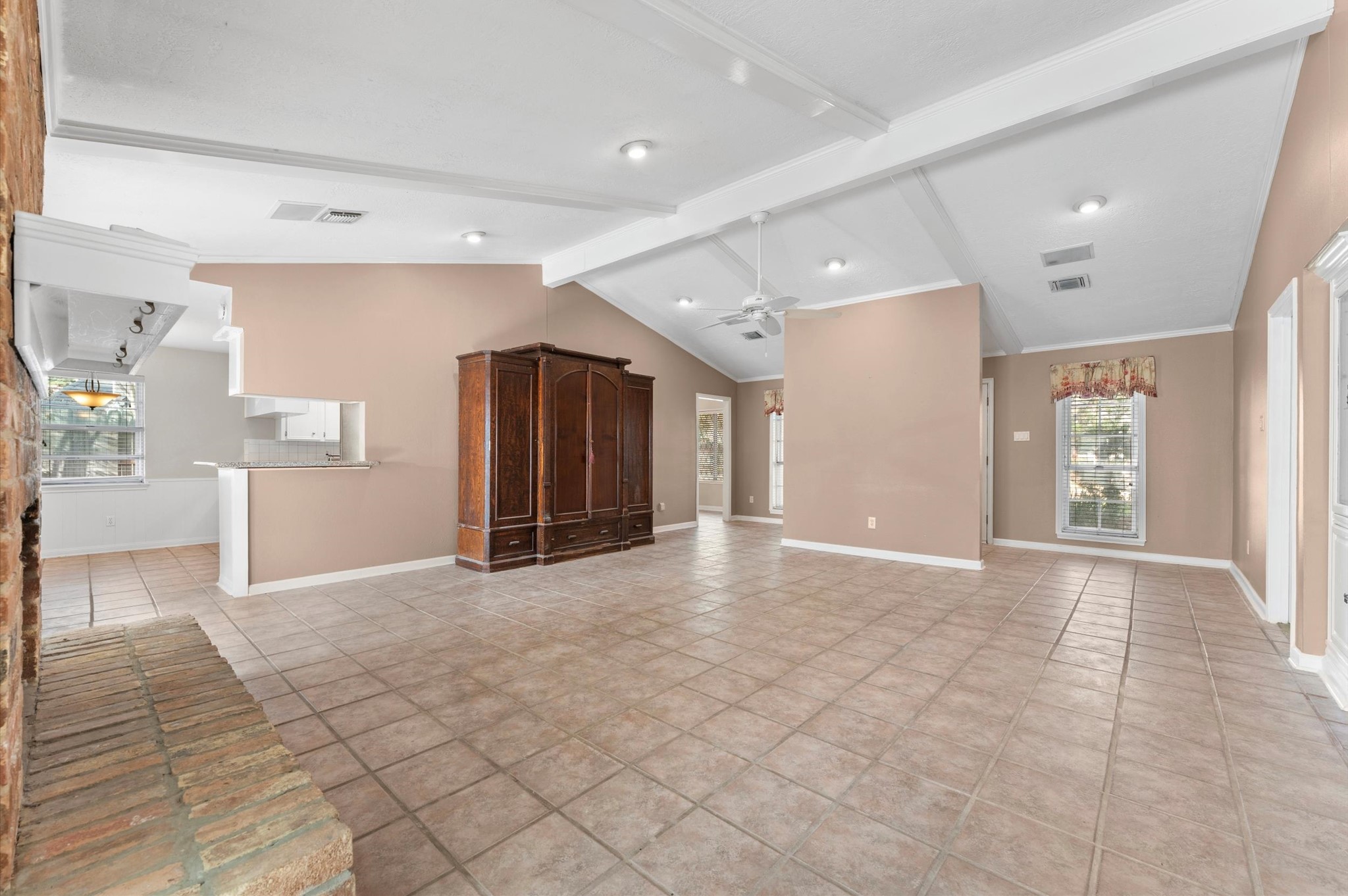 19415 Craigchester Lane Spring, TX 77388 - Photo 8 of 31 a view of an empty room with kitchen and window