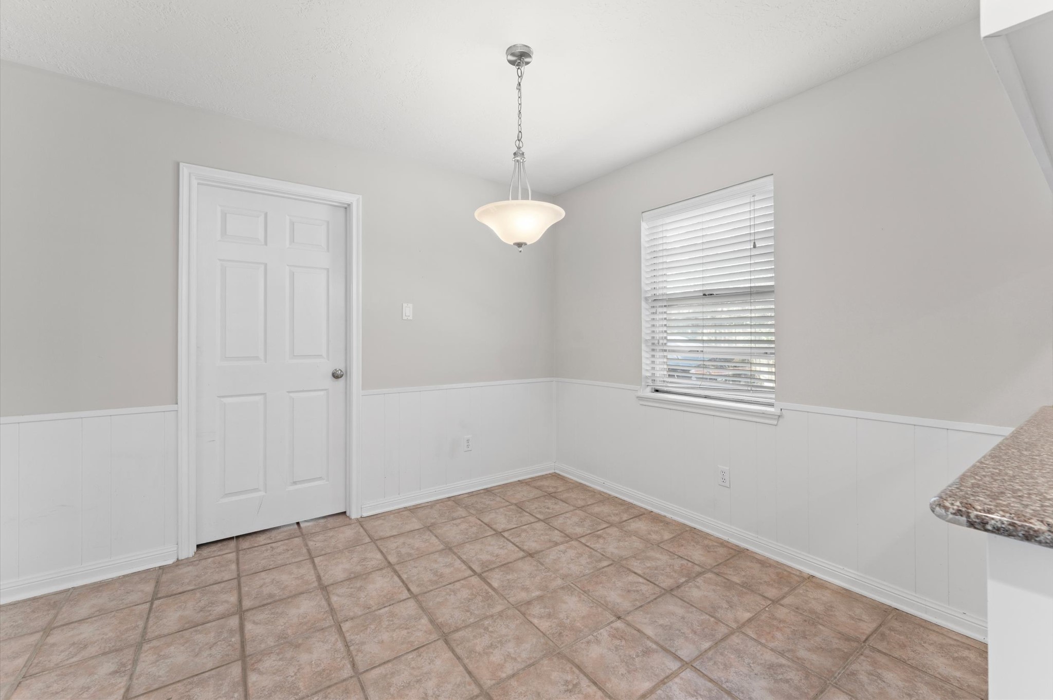 19415 Craigchester Lane Spring, TX 77388 - Photo 9 of 31 a view of a room with a window and ceiling fan