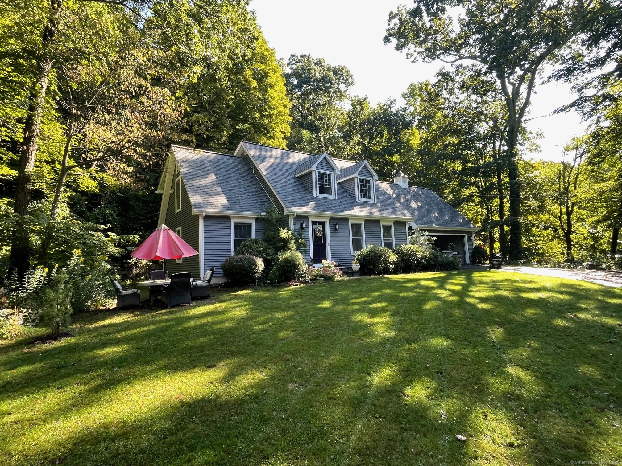 10 Cooksville Road Somers, CT 06071 - Photo 1 of 1 a front view of house with yard and green space
