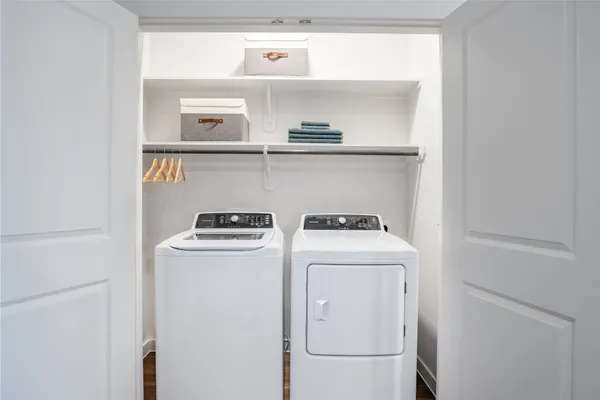 a utility room with dryer and washer