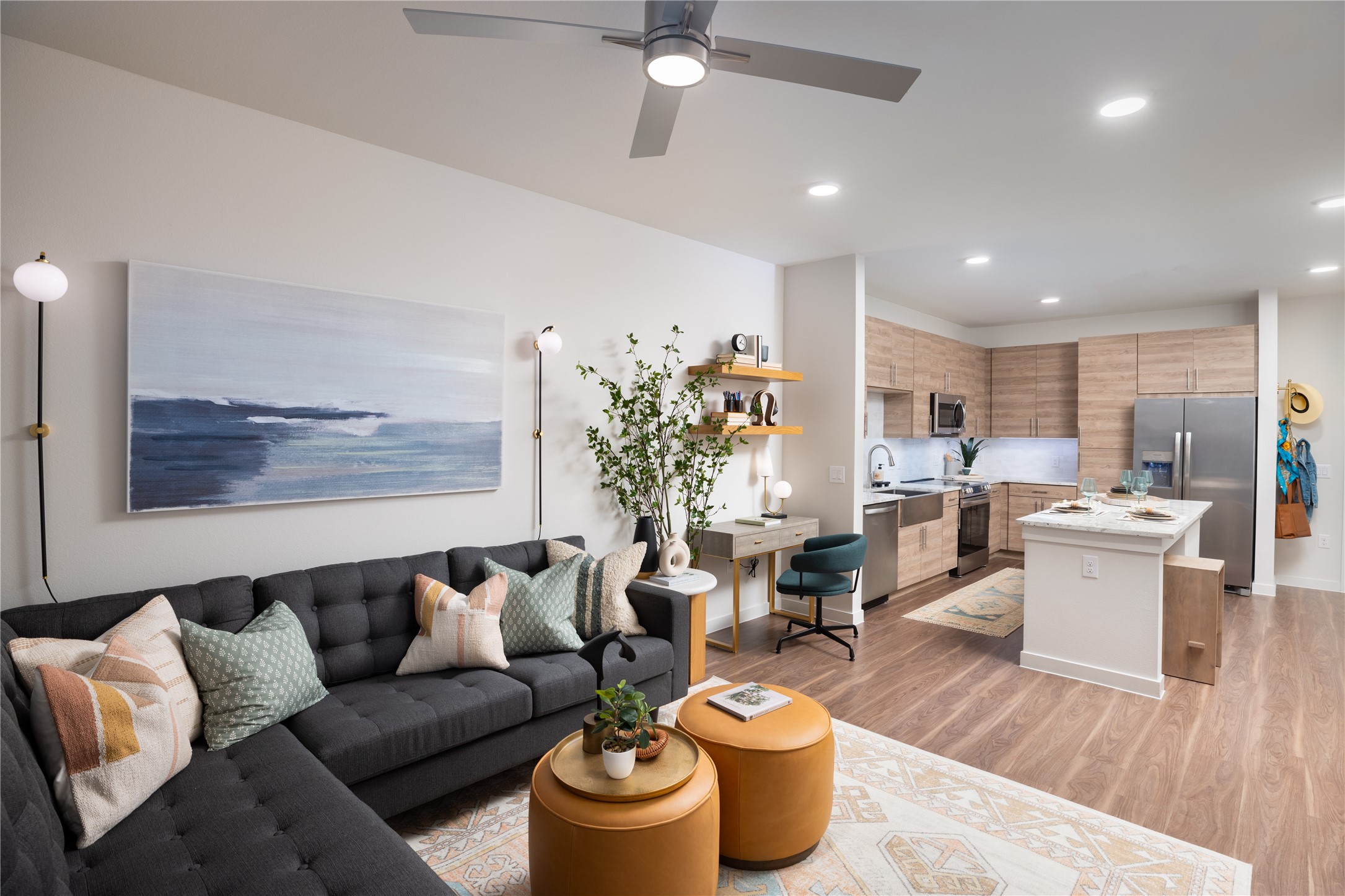 9302 Fry Road, Unit A1313 Cypress, TX 77433 - Photo 6 of 11 a living room with furniture or wooden floor and a potted plant