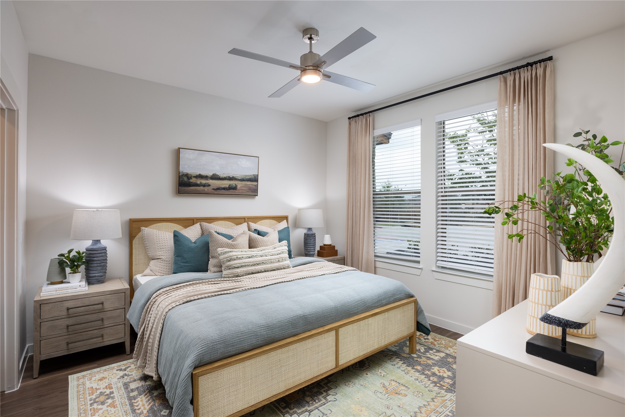 9302 Fry Road, Unit A1313 Cypress, TX 77433 - Photo 7 of 11 a bedroom with a large bed and a window