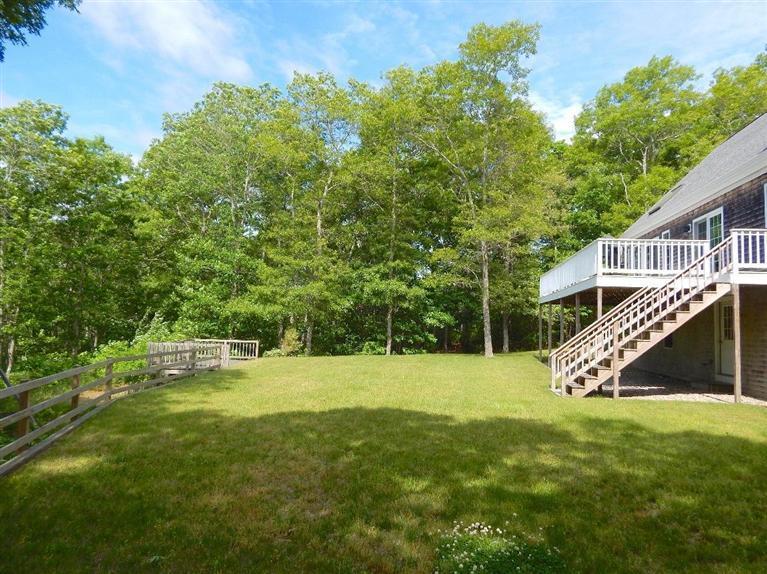 367 Service Road Sandwich, MA 02537 - Photo 13 of 34 a view of a house with a park