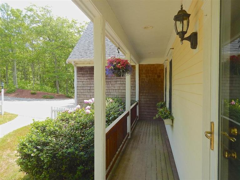 367 Service Road Sandwich, MA 02537 - Photo 15 of 34 a view of balcony with wooden floor and potted plants